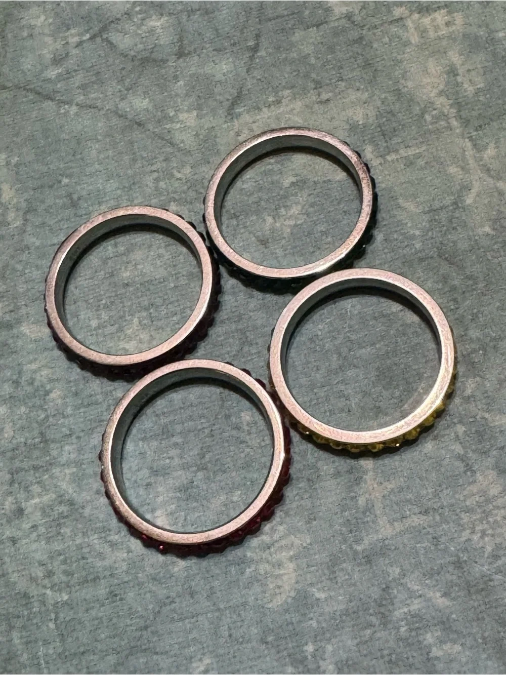 SET OF FOUR STACKABLE STAINLESS STEEL RINGS